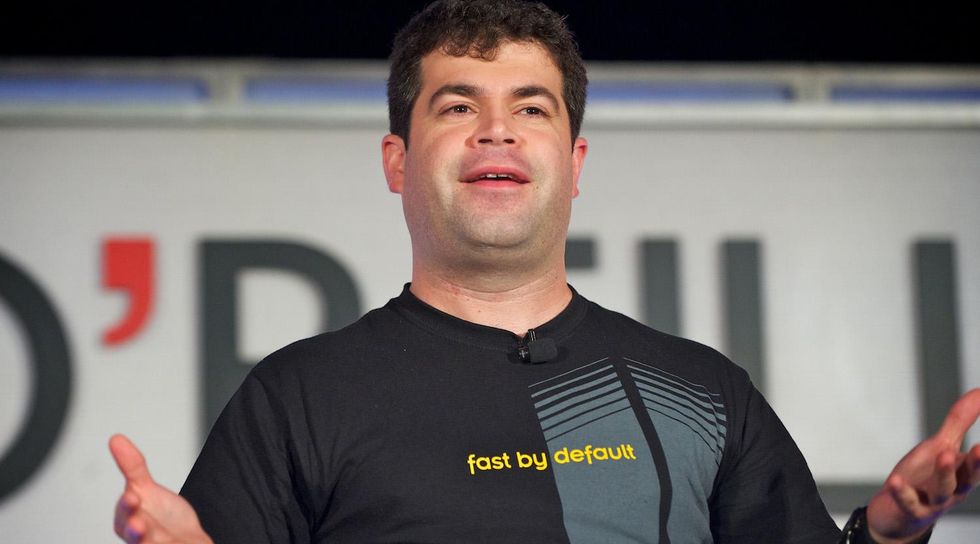 Jesse Robbins on stage at the Velocity conference in 2010